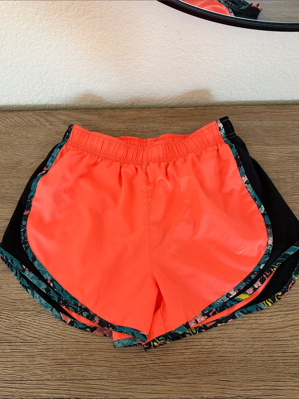 Nike Women's Neon Coral Athletic Shorts with Floral Edge